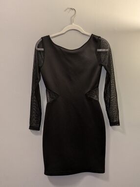 Marilyn Monroe black bodycon dress with mesh sleeves and cutouts size Small.